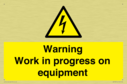 warning-work-in-progress-on-equipmentwith-electrical-hazard-symbol~